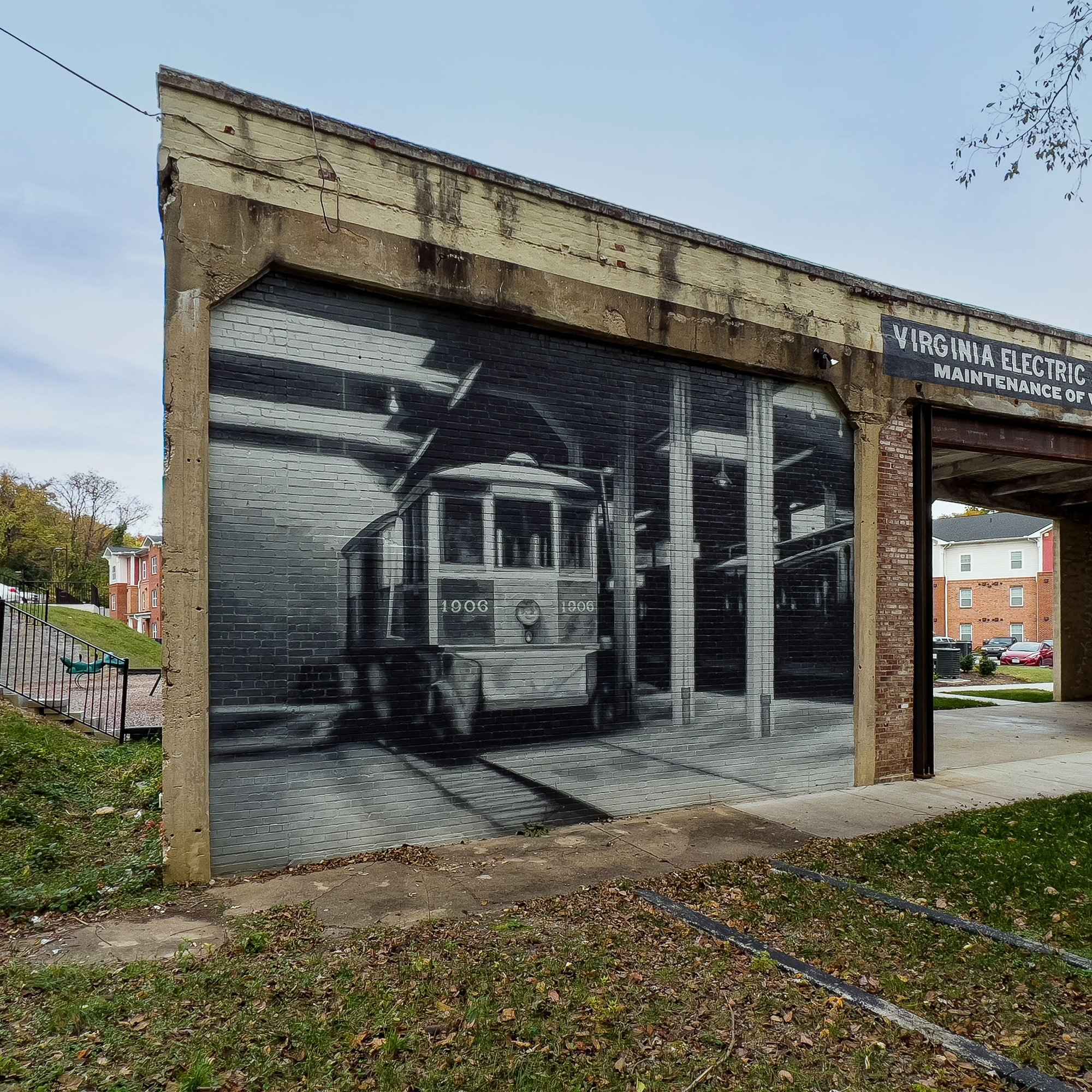 The streetcar bay from the side, the restored sign around the corner